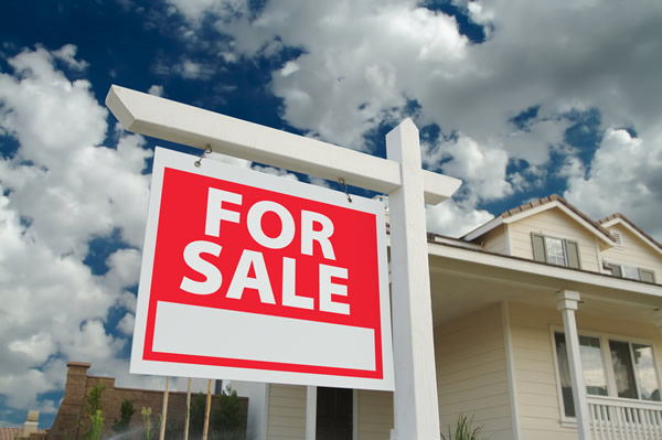 Real_Estate_for_sale_sign_insert_via_bigstock