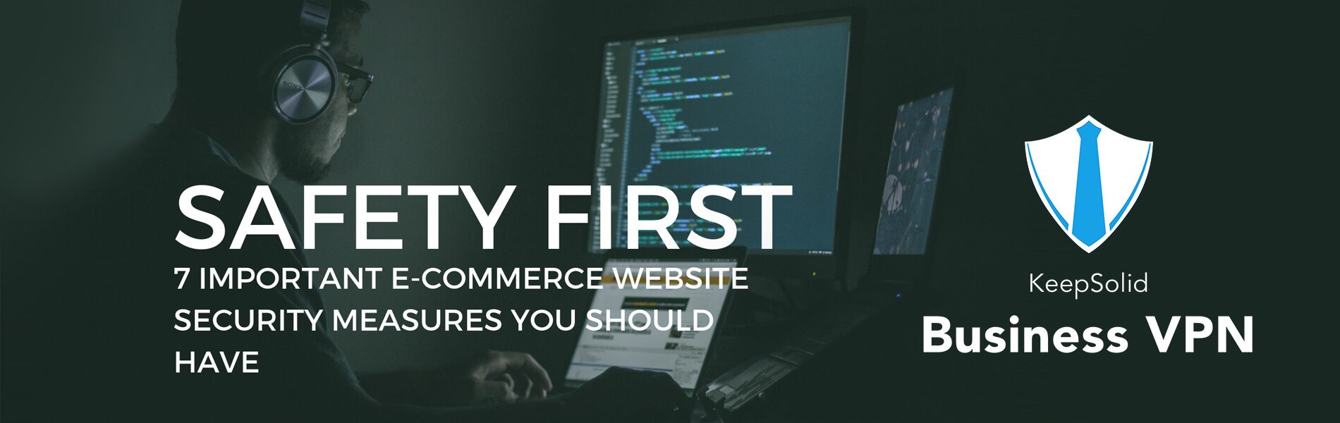 A man in front of a computer, who has taken all security measures to protect his e-commerce website