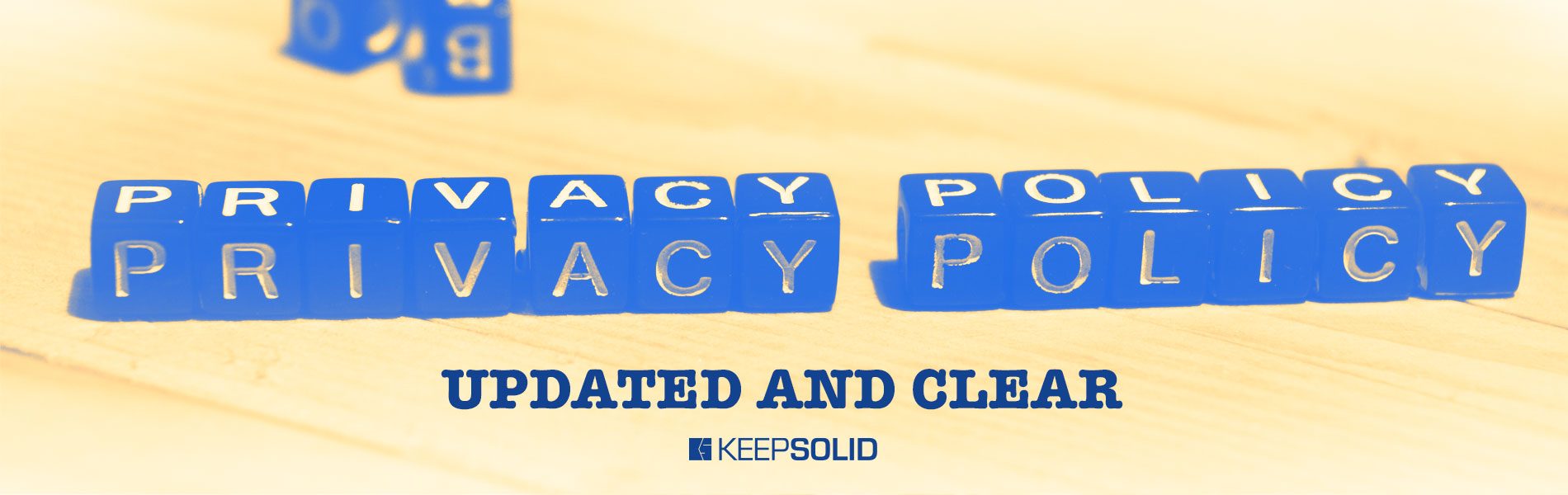 Privacy policy message written on wooden blocks, illustrating the update of KeepSolid Privacy Policy